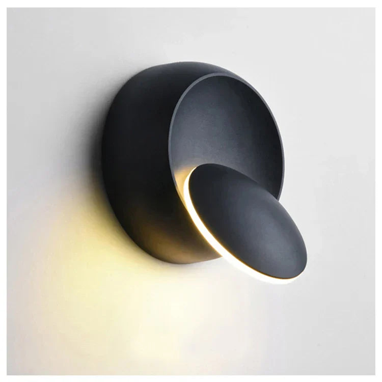 Lámpara de pared con diseño minimalista de orbe